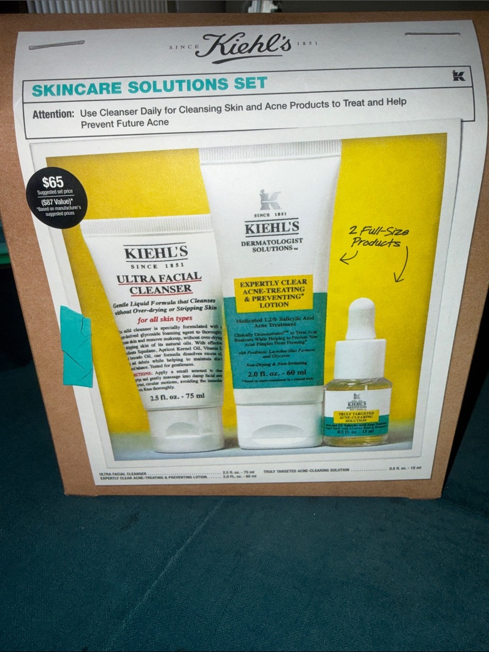 Kiehl's Skincare Solutions Set with Yellow and Teal Accents